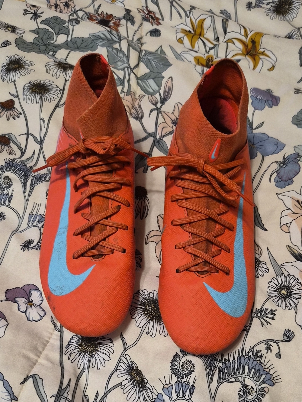 Nike Men’s Orange Athletic Cleats with Light Blue Swoosh
